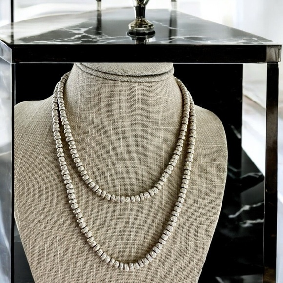 Sterling silver diamond cut bead necklace